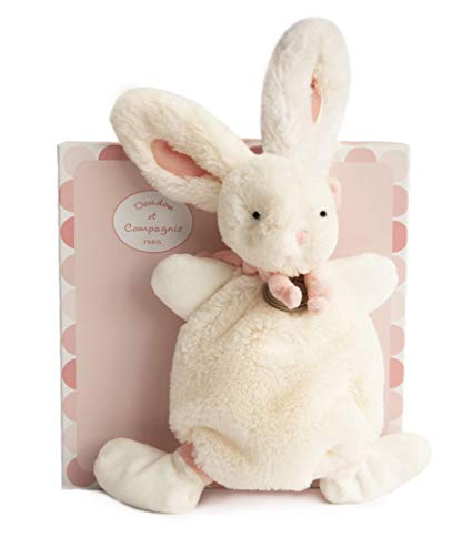 Doudou de coelho rosa na caixa